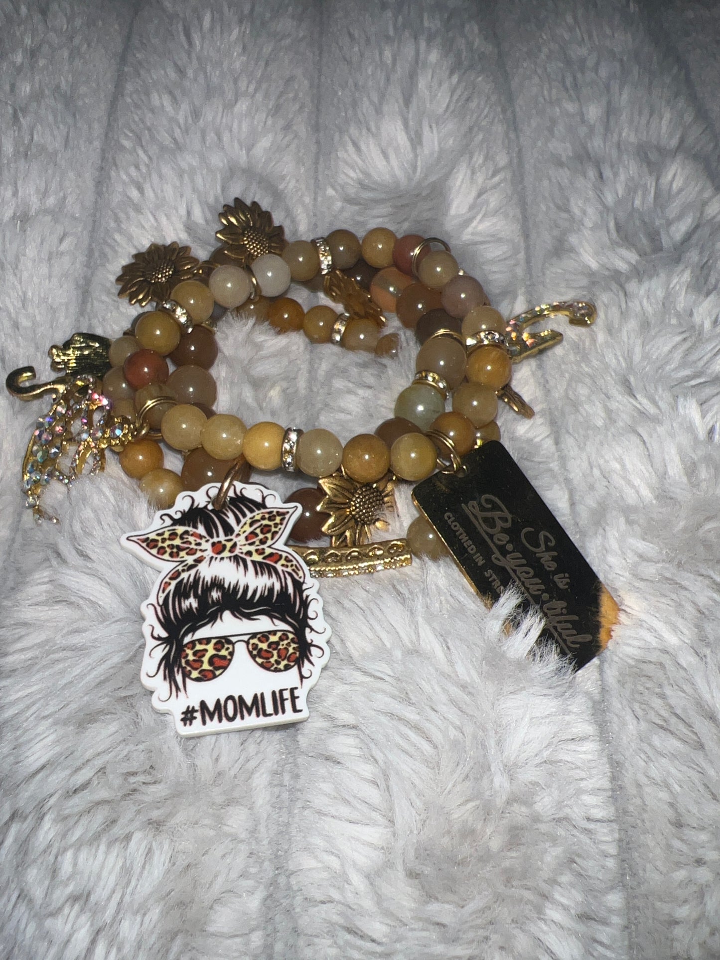 stacked Bracelets (charmed)