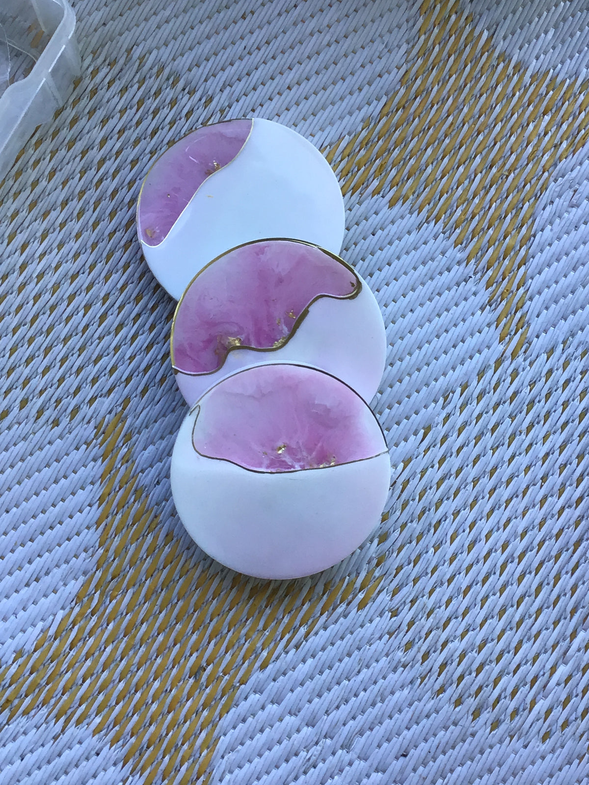 Pink white and gold coasters